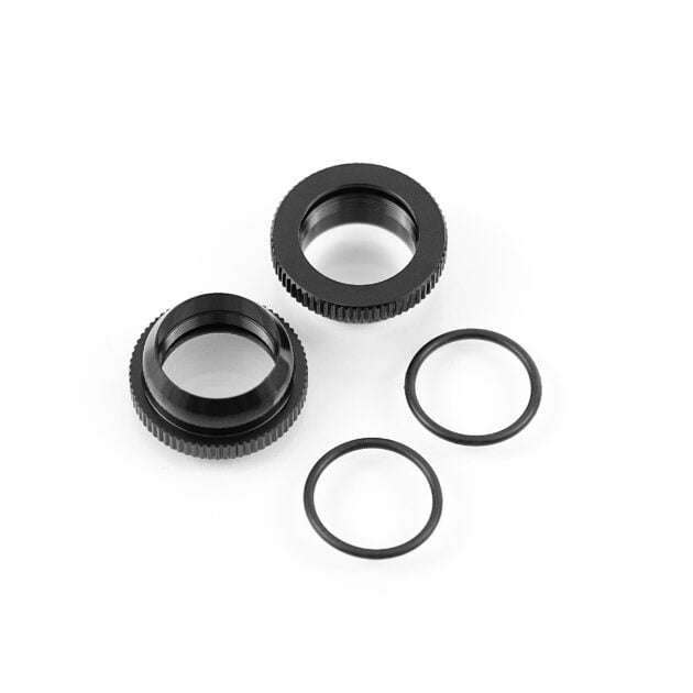 Tekno RC car parts displayed on table